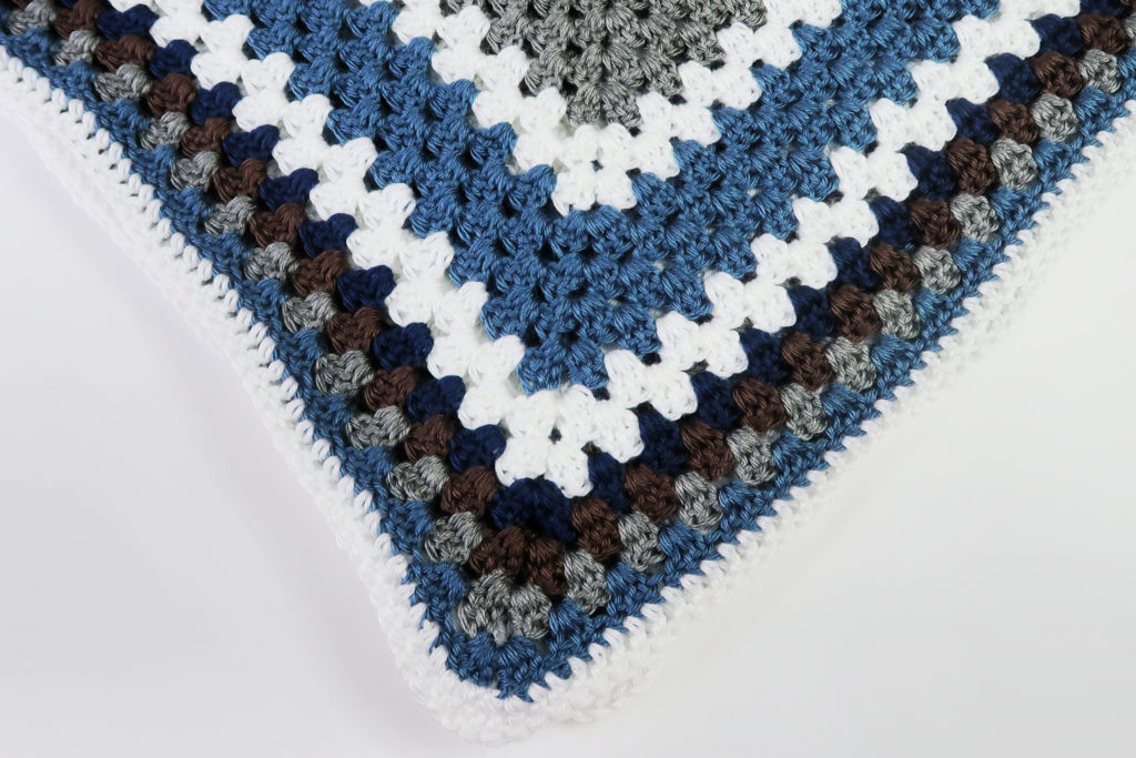 blue and white granny square baby afghan